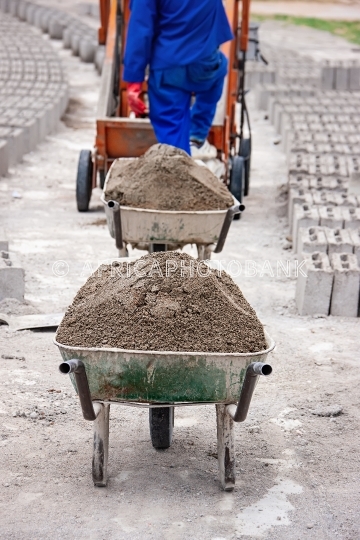 wheelbarrow and bricks